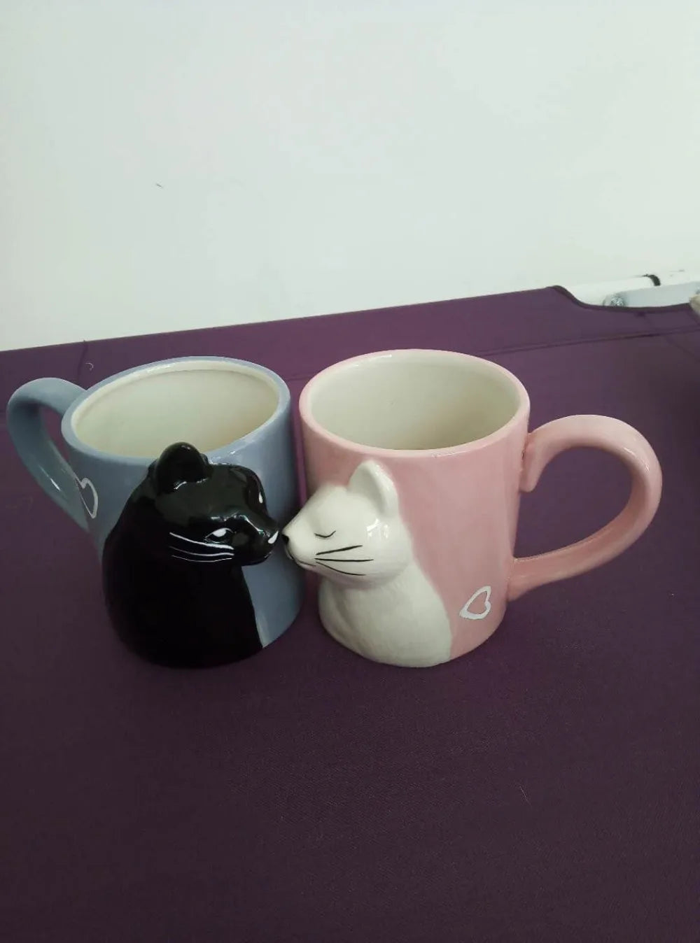 Two 3D ceramic cat couple mugs with kissing faces