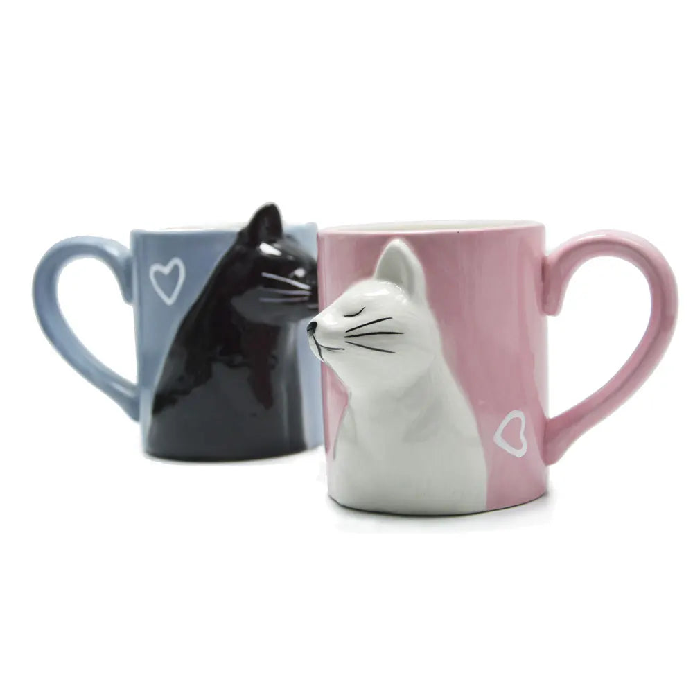 Two 3D ceramic cat couple mugs with kissing faces