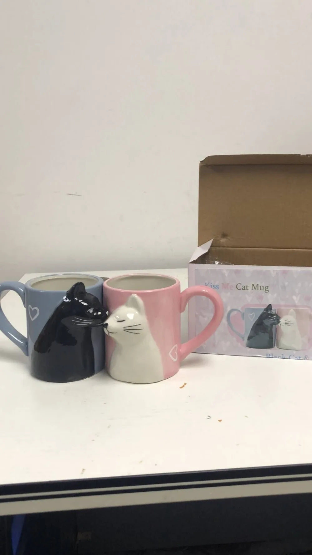 Two 3D ceramic cat couple mugs with kissing faces