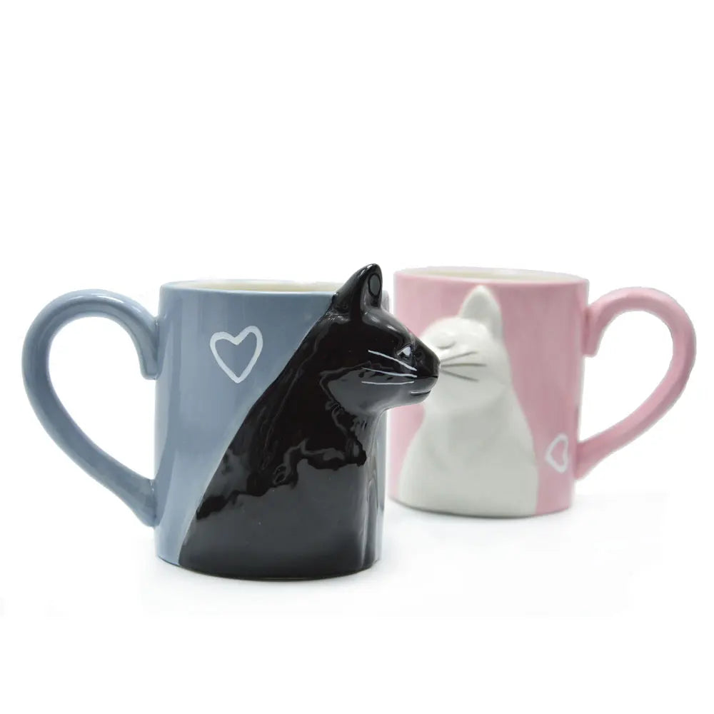 Two 3D ceramic cat couple mugs with kissing faces