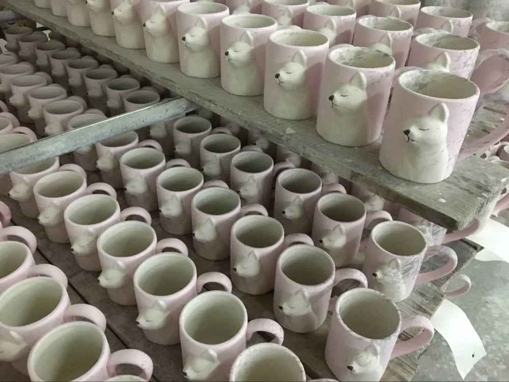 Two 3D ceramic cat couple mugs with kissing faces