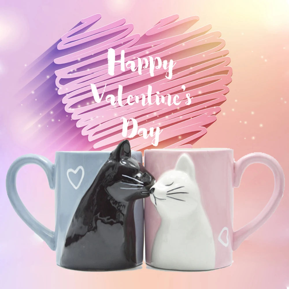 Two 3D ceramic cat couple mugs with kissing faces