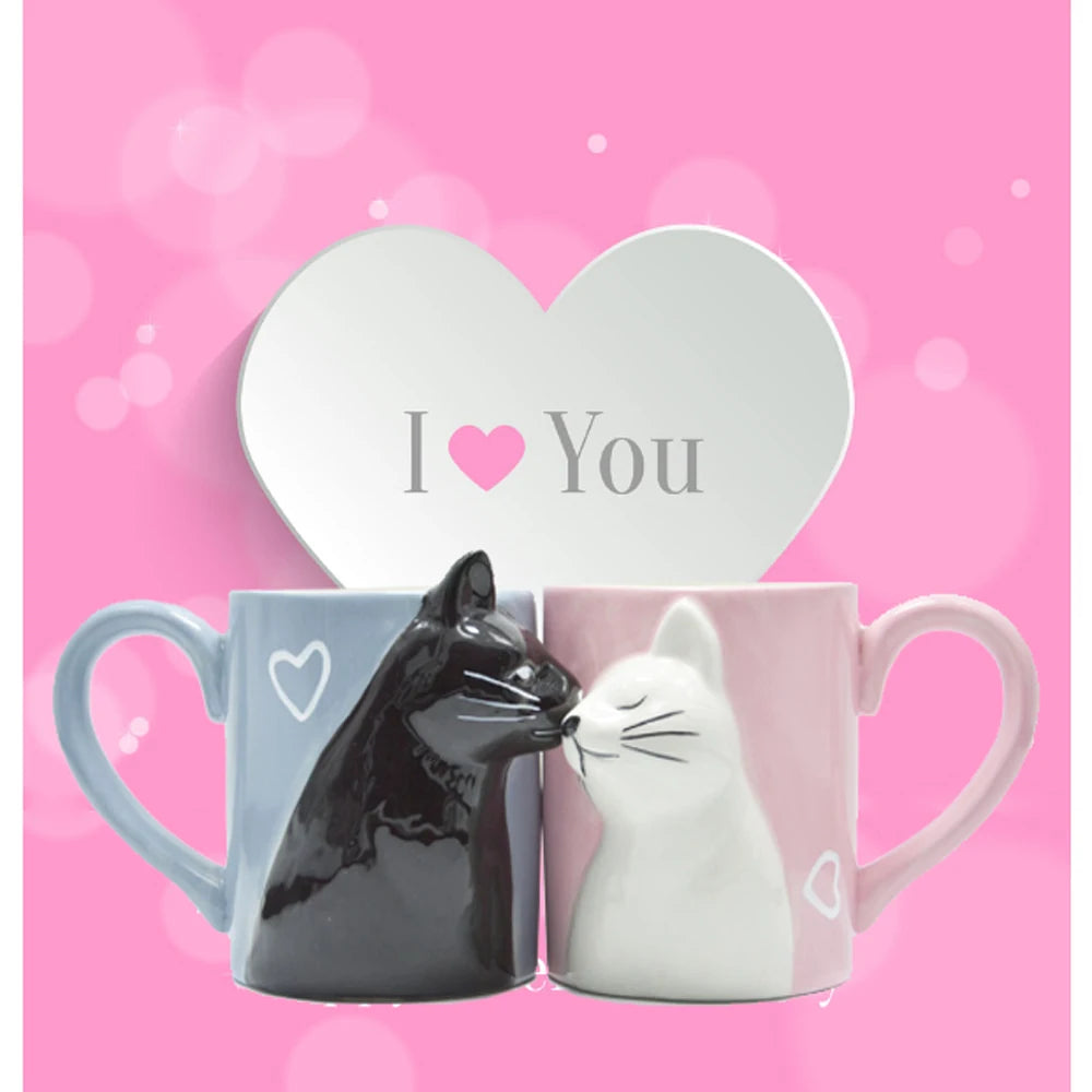Two 3D ceramic cat couple mugs with kissing faces