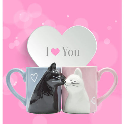 Two 3D ceramic cat couple mugs with kissing faces