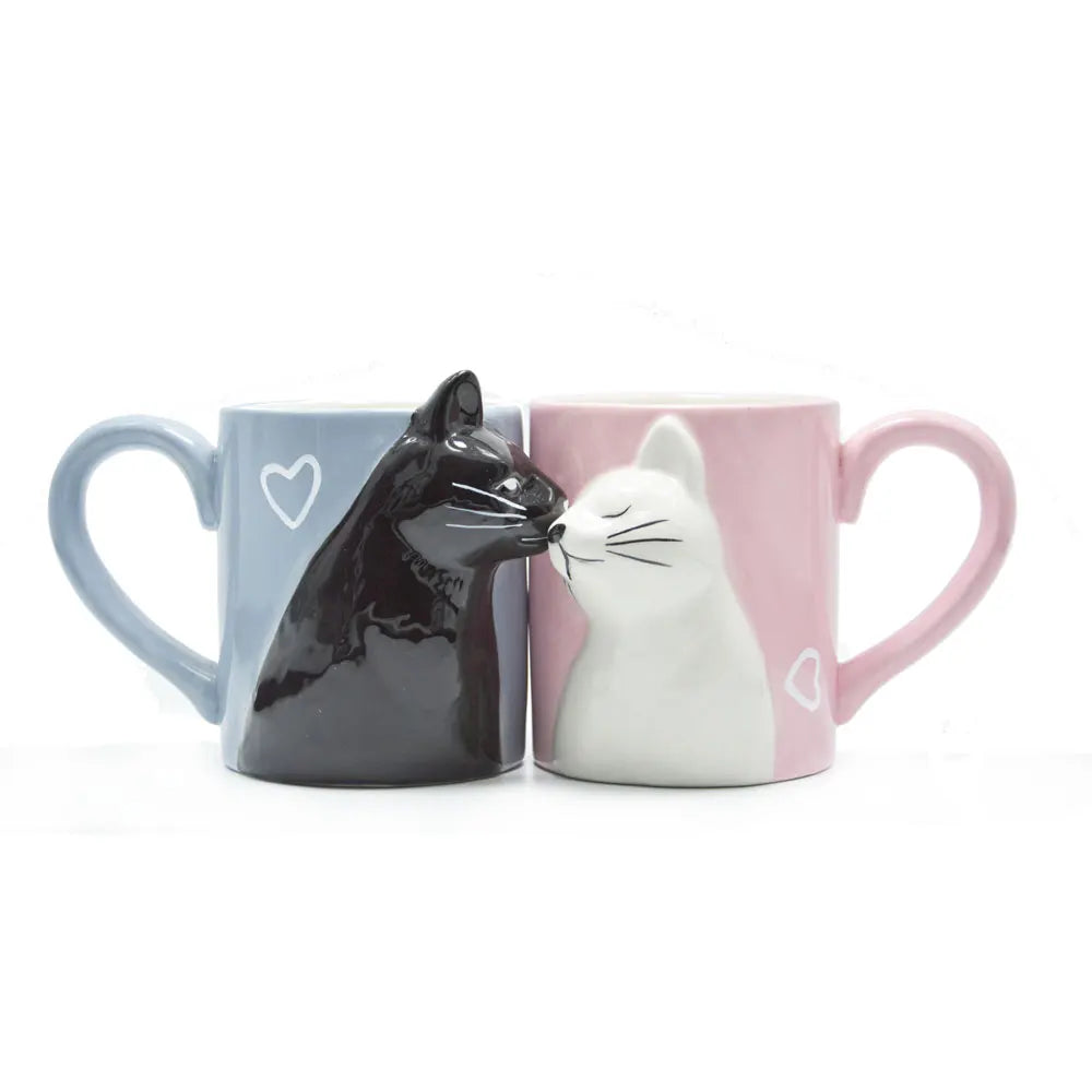 Two 3D ceramic cat couple mugs with kissing faces