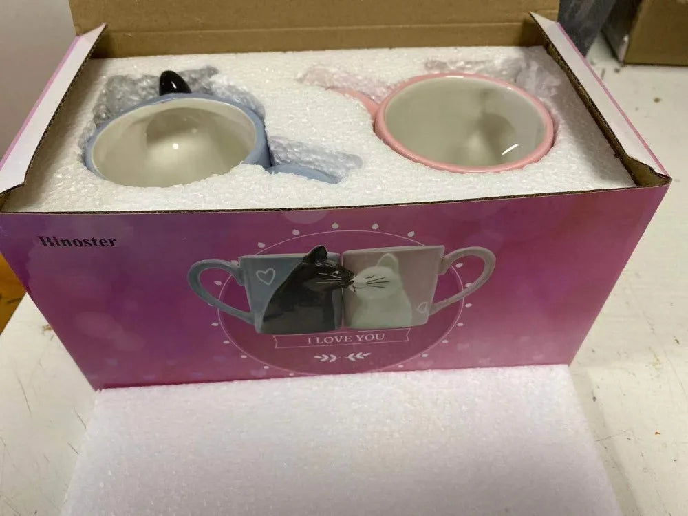 Two 3D ceramic cat couple mugs with kissing faces