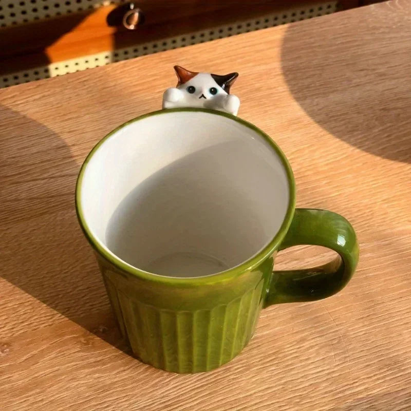 Stackable ceramic mug with cartoon cat design