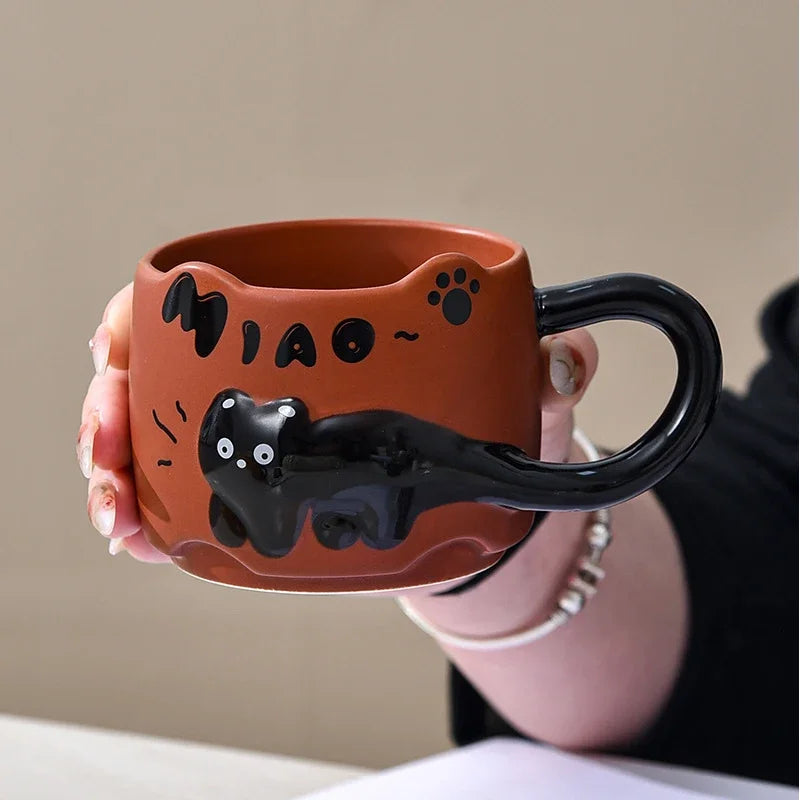 Stackable ceramic mug with cartoon cat design