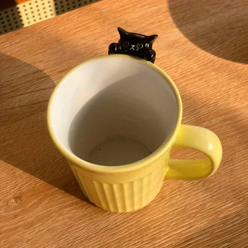 Stackable ceramic mug with cartoon cat design