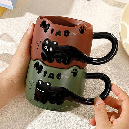 Stackable ceramic mug with cartoon cat design